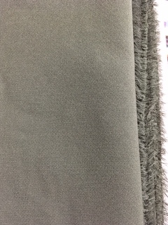 コート作ろうと買った布。この面は裏なんだけど、表色はザク色で鹿がいる事に今気がついた